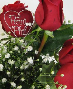 unusual idea for your wedding bouquet, initials in the centre of the bridal bouquet