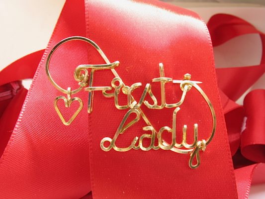 First Lady gold wire name pin